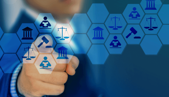 A person's hand points to a set of hexagonal icons, depicting a judge's gavel, a courthouse, scales of justice and a figure of a person reading a book or document